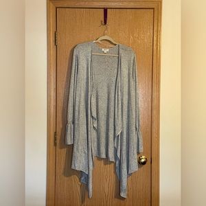 Gray cascading open front cardigan with ruffle cuffed sleeves